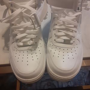 A white pair of Nike Air Force Ones